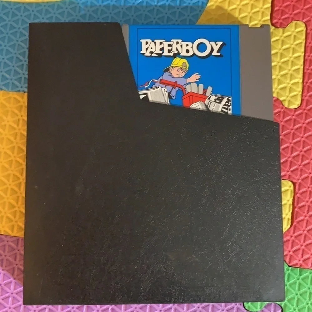 Vintage Paperboy cassette game Nintendo Entertainment System, 1988 & book